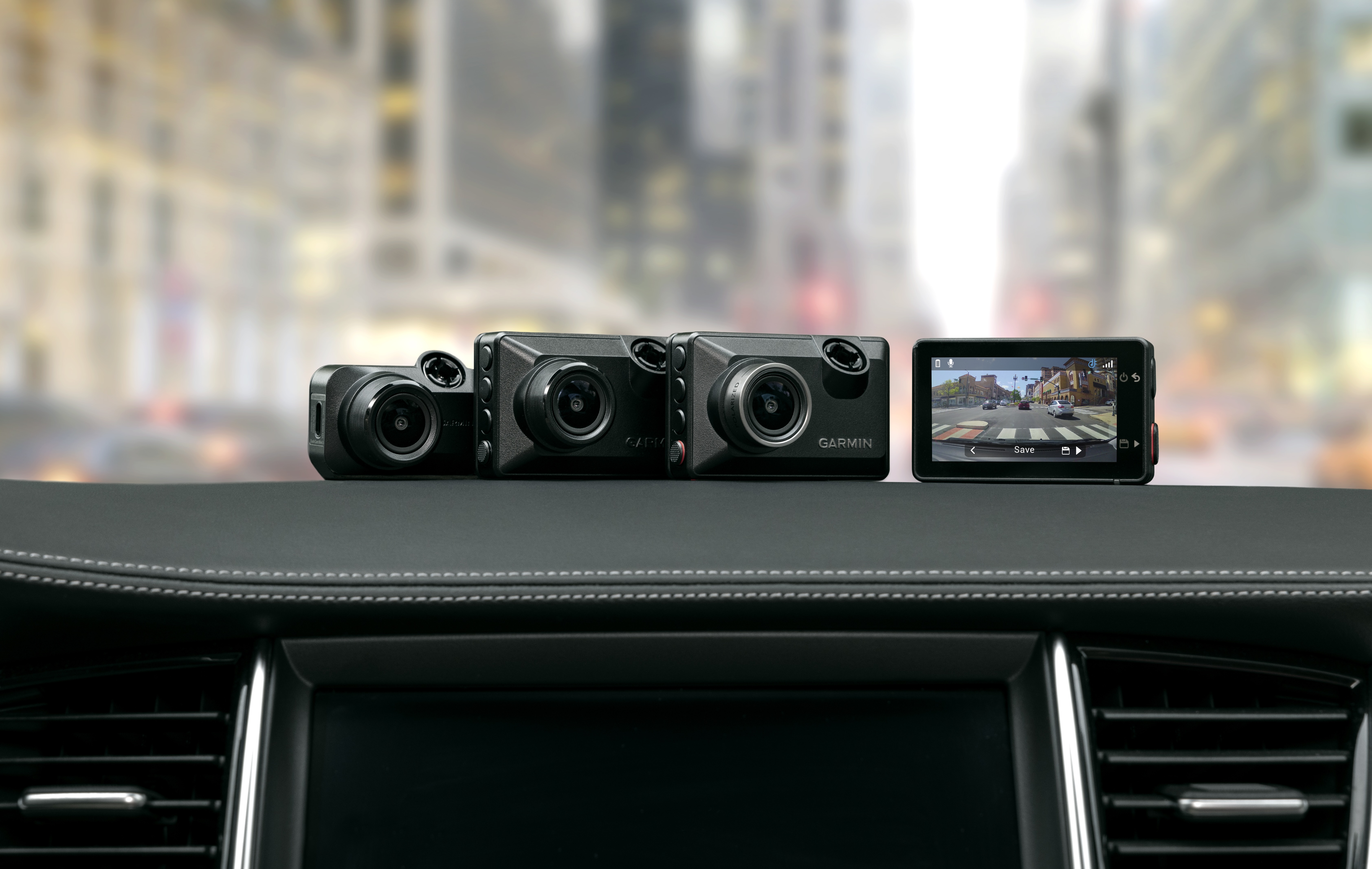 Garmin X Series Dash Cams On Car Dash Board